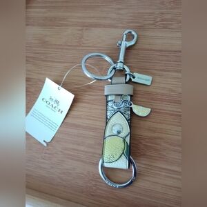 Coach Lemon Print Trigger Snap Bag Charm